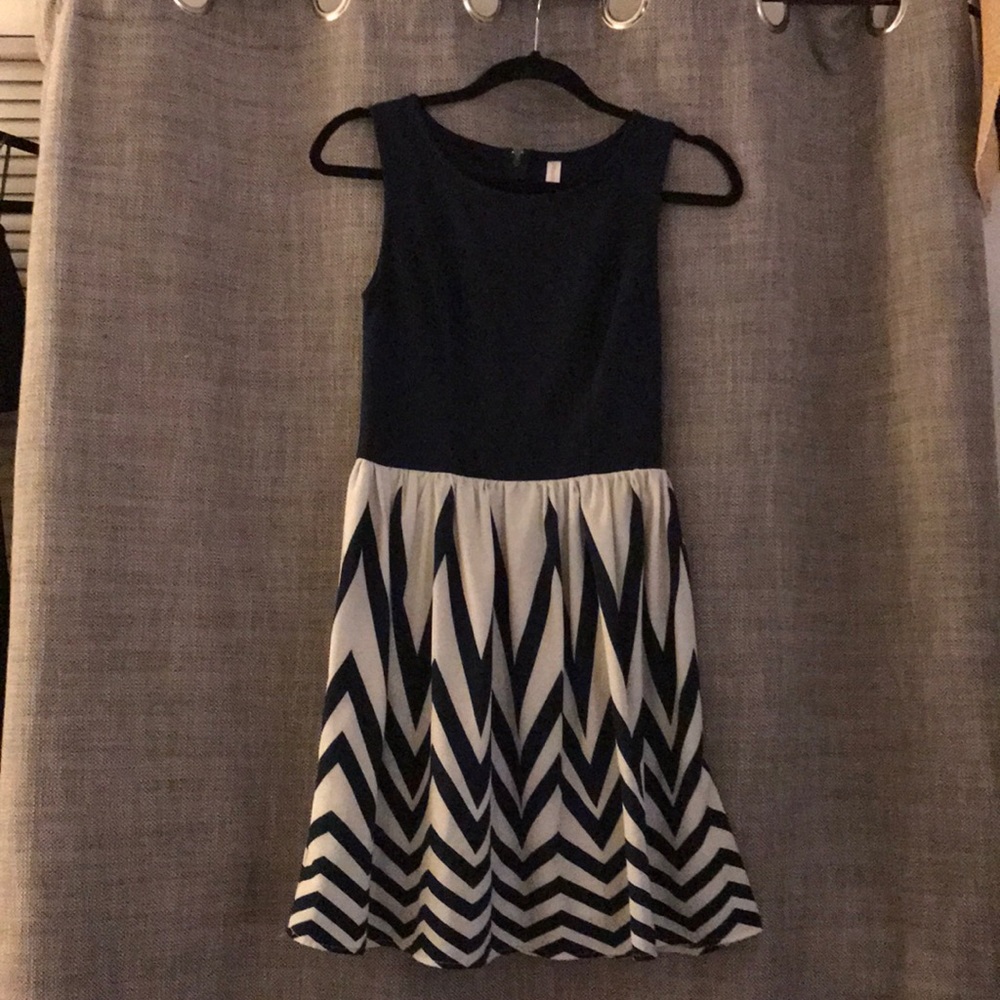 Navy blue and white patterned dress.